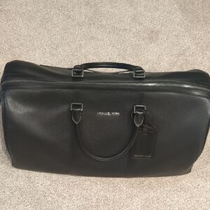 Michael Kors Black Duffel Bag , And A Luggage Tag Passport Holder Set Combo.
